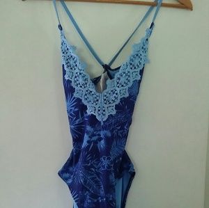 YMI size L one piece bathing suit